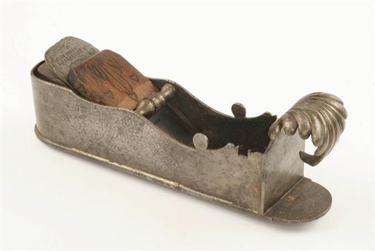 Early iron mitre plane, with acanthus leaf hold. David Stanley auctions. c 2014